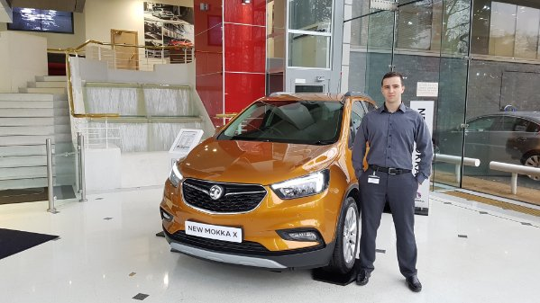 Standing next to new Vauxhall Mokka x car release,
during General Motors internship